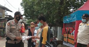 Polres Kep Seribu Himbau ProKes dan Bagikan 1.500 Masker ke Warga
